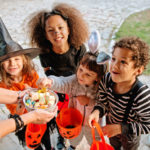Children in Halloween costumes, trick or treating