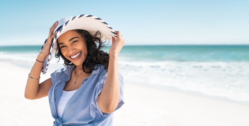 Portrait,Of,Stylish,Latin,Hispanic,Woman,With,White,Straw,Hat